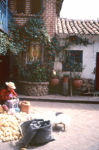 woman in courtyard Cusco Peru